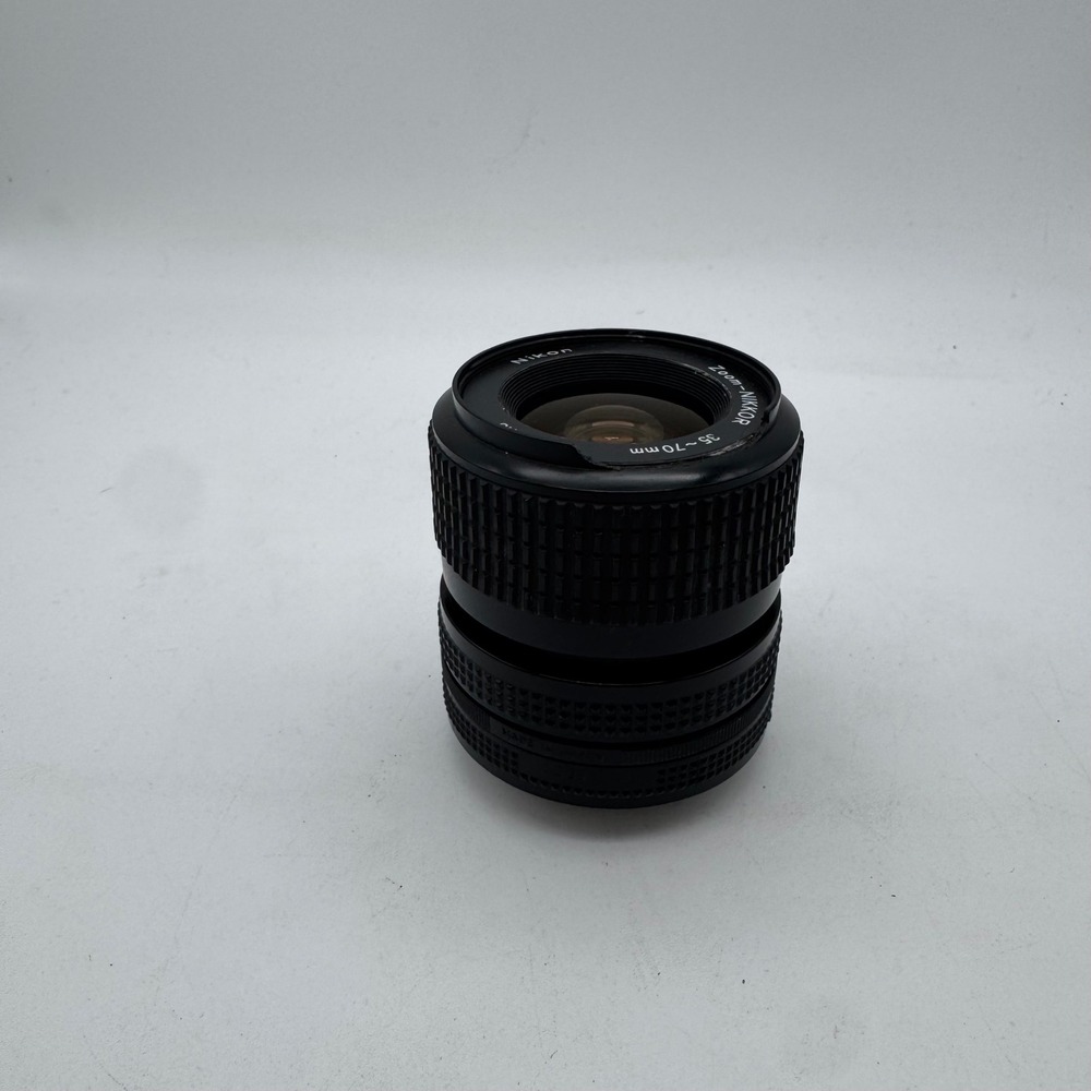 Nikon Nikkor 35-70mm F/3.5-4.8 Manual Focus Zoom Lens & Canon 52mm UV Protector